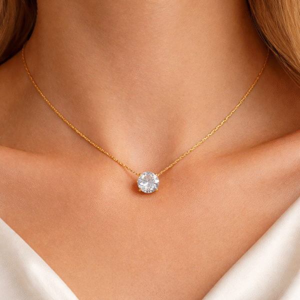 Gold solitaire AD stone pendant necklace worn on neck with minimal elegant styling