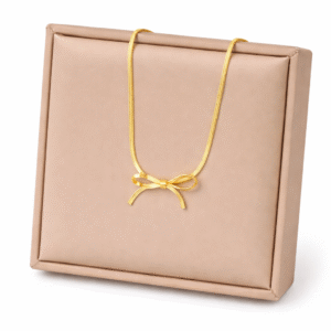 Gold bow pendant necklace