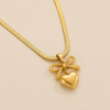 NAMIKA gold bow heart pendant necklace for women crafted from premium stainless steel, anti tarnish, waterproof and hypoallergenic minimalist jewellery for everyday wear.
