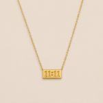 NAMIKA 1111 angel number necklace for women crafted from premium stainless steel with anti tarnish, waterproof and hypoallergenic gold finish, minimalist manifestation jewellery for everyday wear.