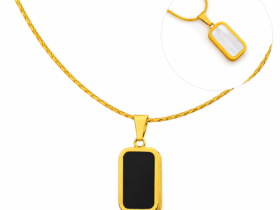Gold bar pendant necklace with black and white reversible design on snake chain