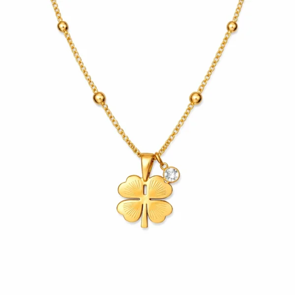 Gold clover pendant necklace with crystal accent on delicate chain